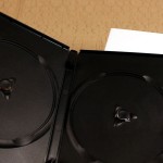 Two DVD cases used for making the Handy Disc Keeper